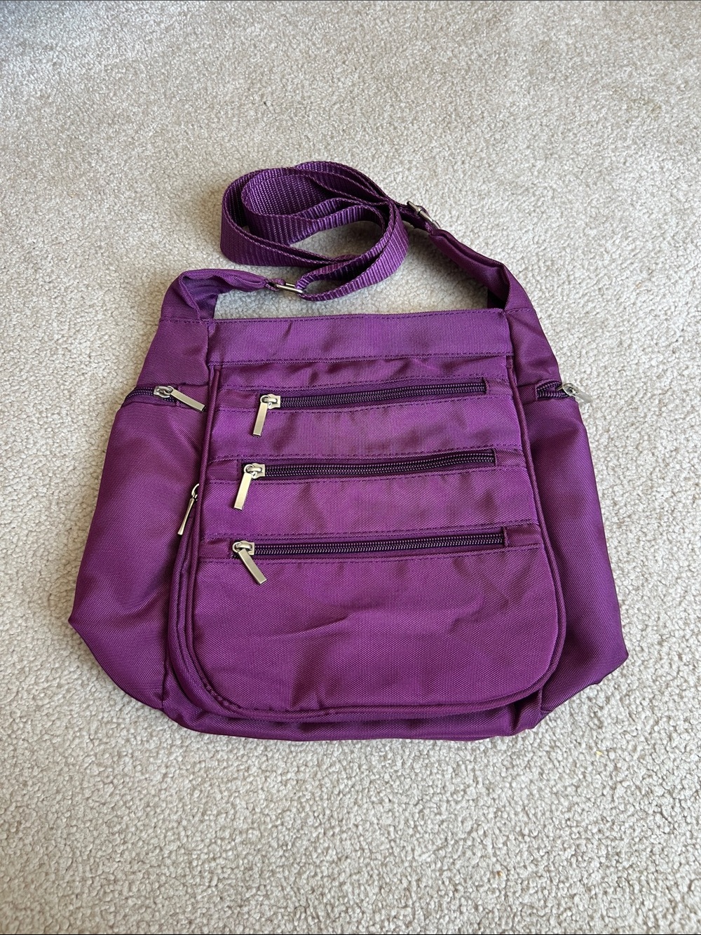 Compact Purple Crossbody Bag with Triple Front Zips